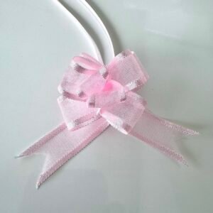 Embellissement nœud surprise rose bonbon
