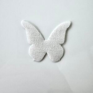 Embellissement papillon en lin écru